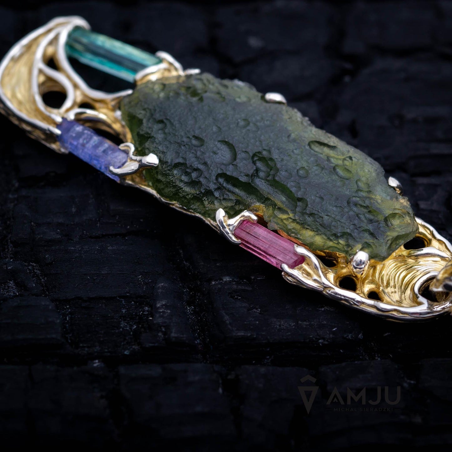 Moldavite with raw crystals of Pink Tourmaline, Green Beryl and Tanzanite, pendant