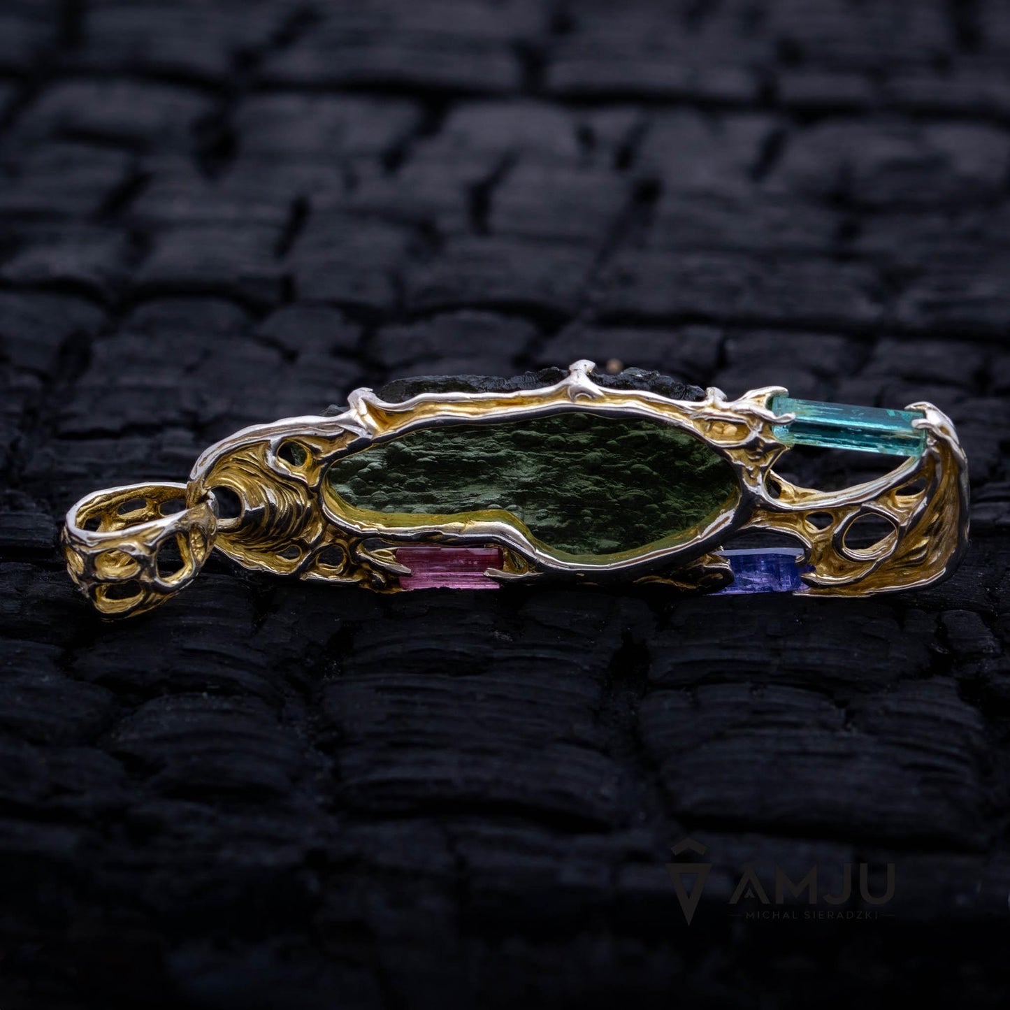 Moldavite with raw crystals of Pink Tourmaline, Green Beryl and Tanzanite, pendant