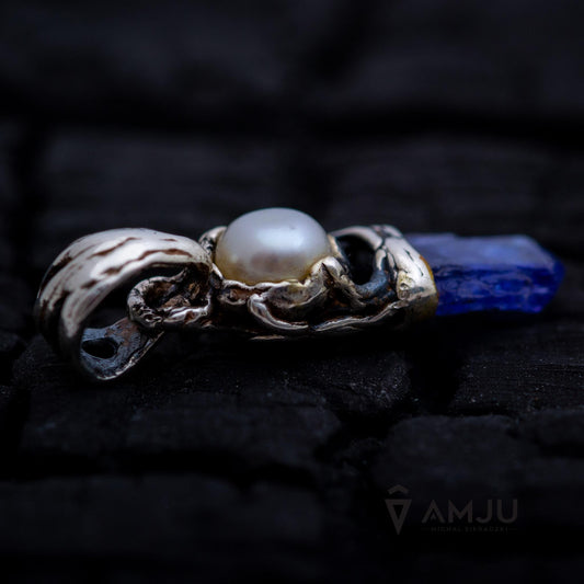Raw Tanzanite crystal with freshwater pearl, pendant